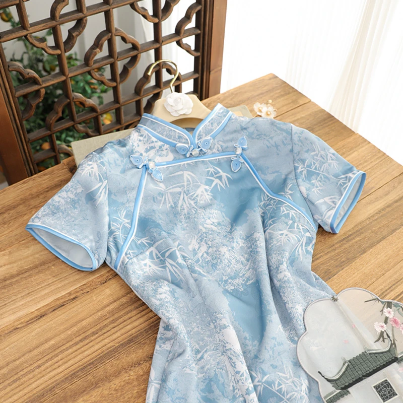 俏娘鱼新中式旗袍国风新款气质优雅日常可穿蓝色提花短袖复古改良