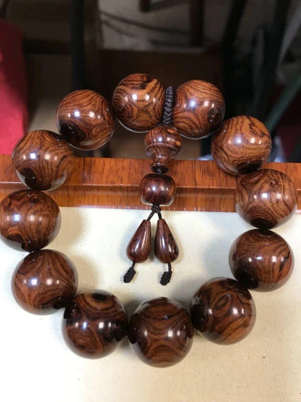 传说经典海南黄花梨老糠高荧光对眼2.0cm手串