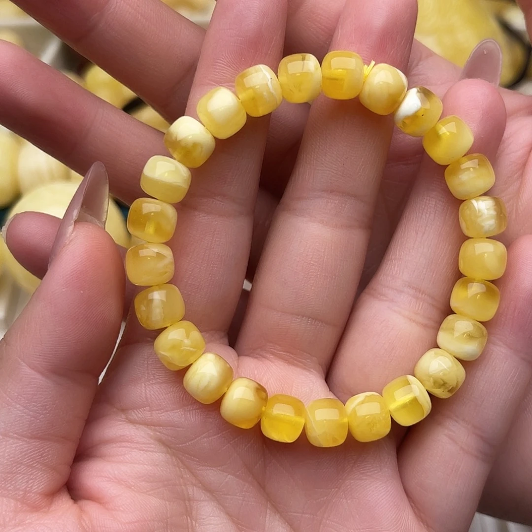 琥珀未镶嵌裸石蜜蜡手串卡八金白微瑕