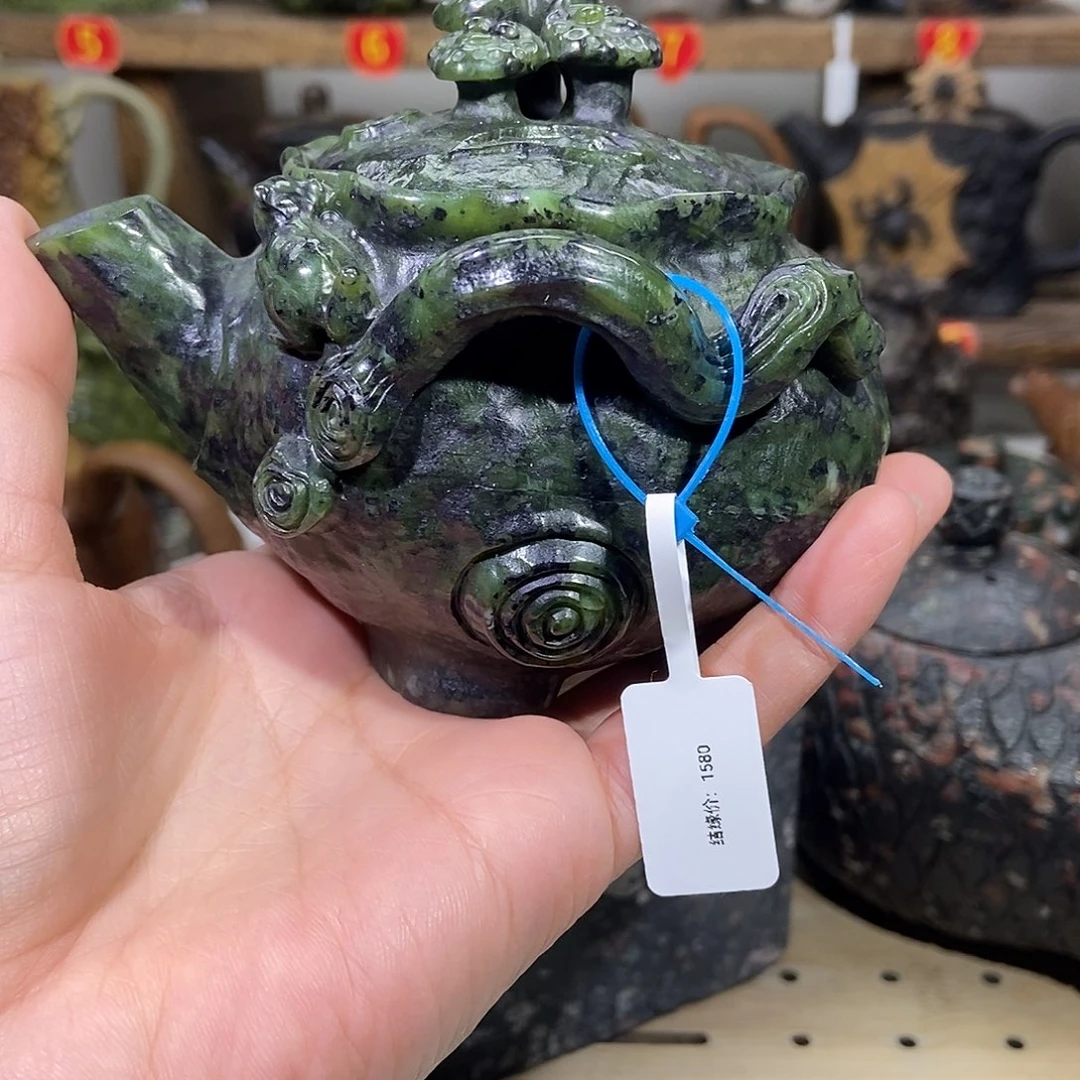探***士石材藏玉药王石手抓壶有瑕