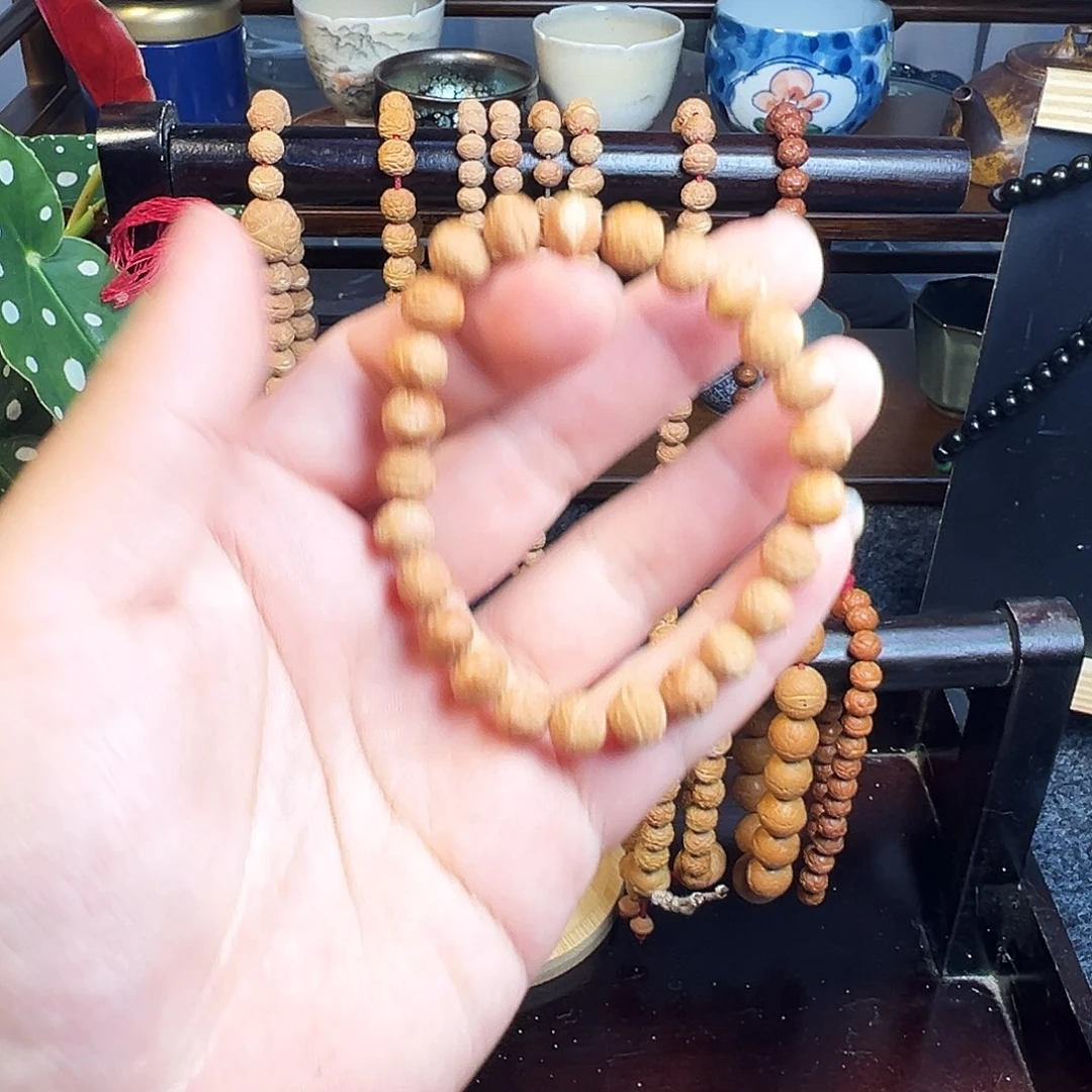 萌***鹉凤眼菩提吊坠野生酸枣核手串