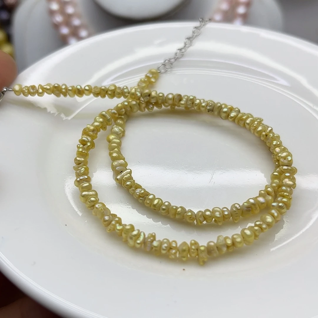 淡水珍珠钛钢颈饰宇**量