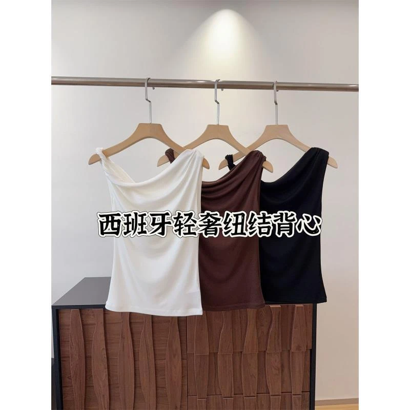 西班牙轻奢  扭结设计！气质斜领露肩背心