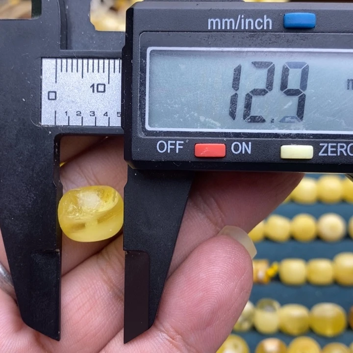 琥珀未镶嵌裸石36号12.4*9.7喇叭口微瑕