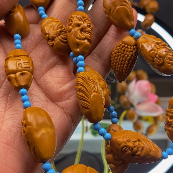 橄榄核吊坠哦杨杨杨杨杨杨在我哦哦哦哦