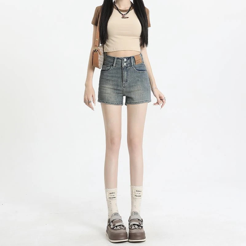 美式复古水洗做旧性感辣妹女款显瘦修身弹力包臀热裤牛仔短裤女潮