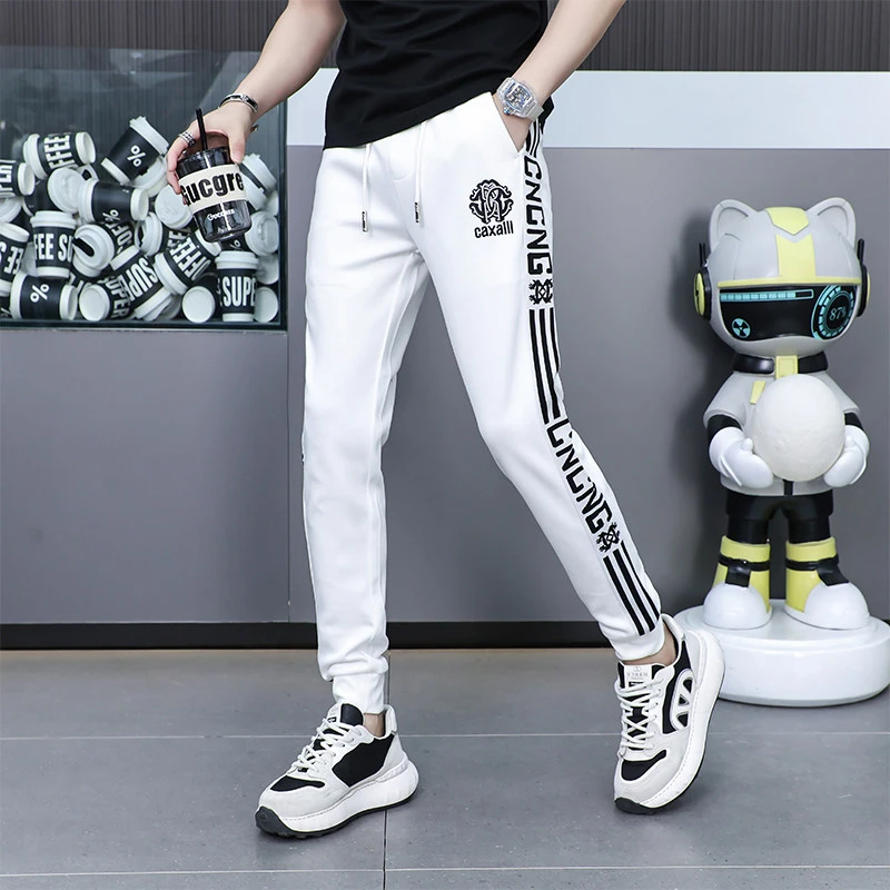 男士薄款休闲裤秋季新款时尚束脚运动裤高端白色印花字母卫裤男款