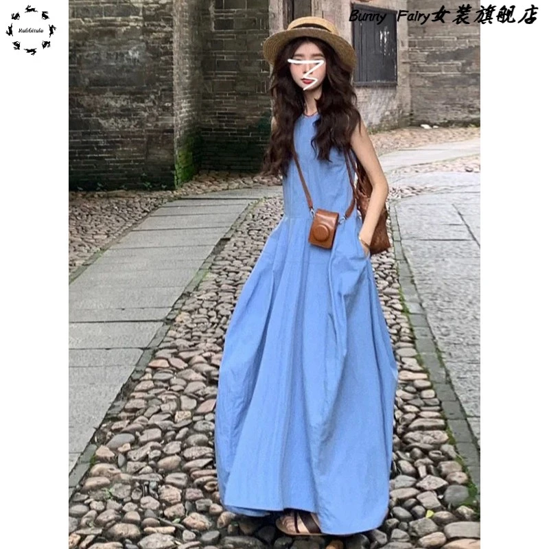 茶歇法式蓝色无袖背心连衣裙女2025夏季新款度假风沙滩a字长裙