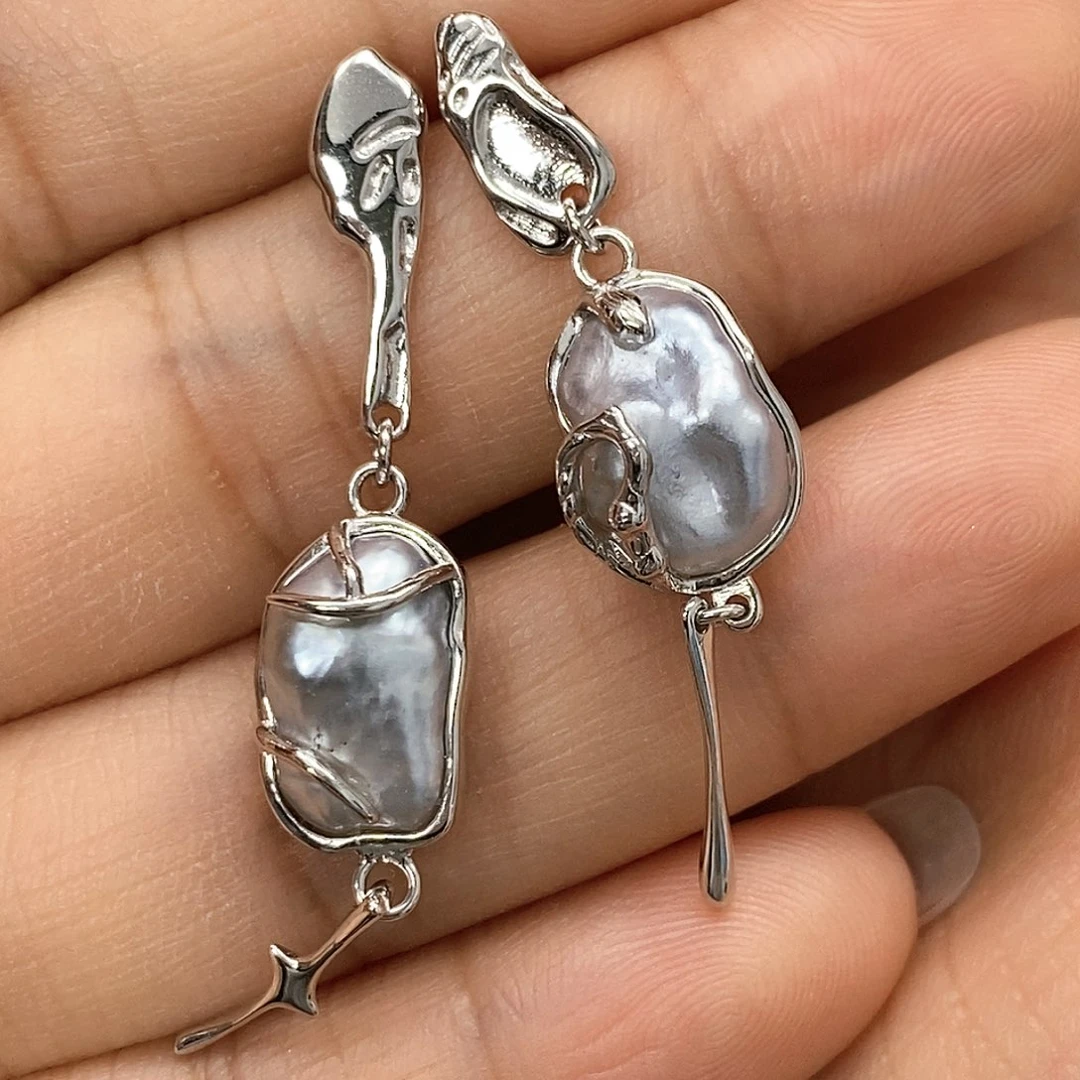 银S925镶嵌海水珍珠耳饰意**面