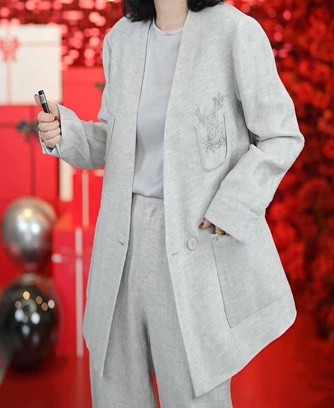 时尚百搭休闲设计感人字纹亚麻西装外套/1106