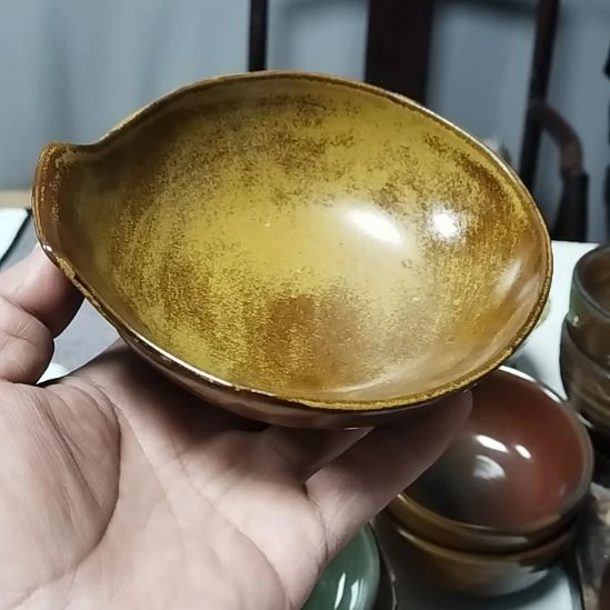 一***奕陶瓷片磁州窑五厂黄金釉把碗