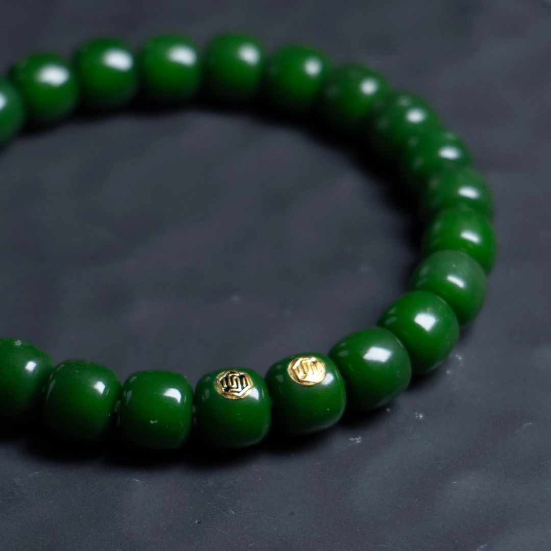 白玉菩提根绿9-8手串