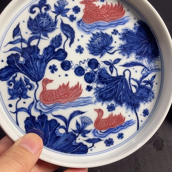 唉***喂青花釉里红主人杯