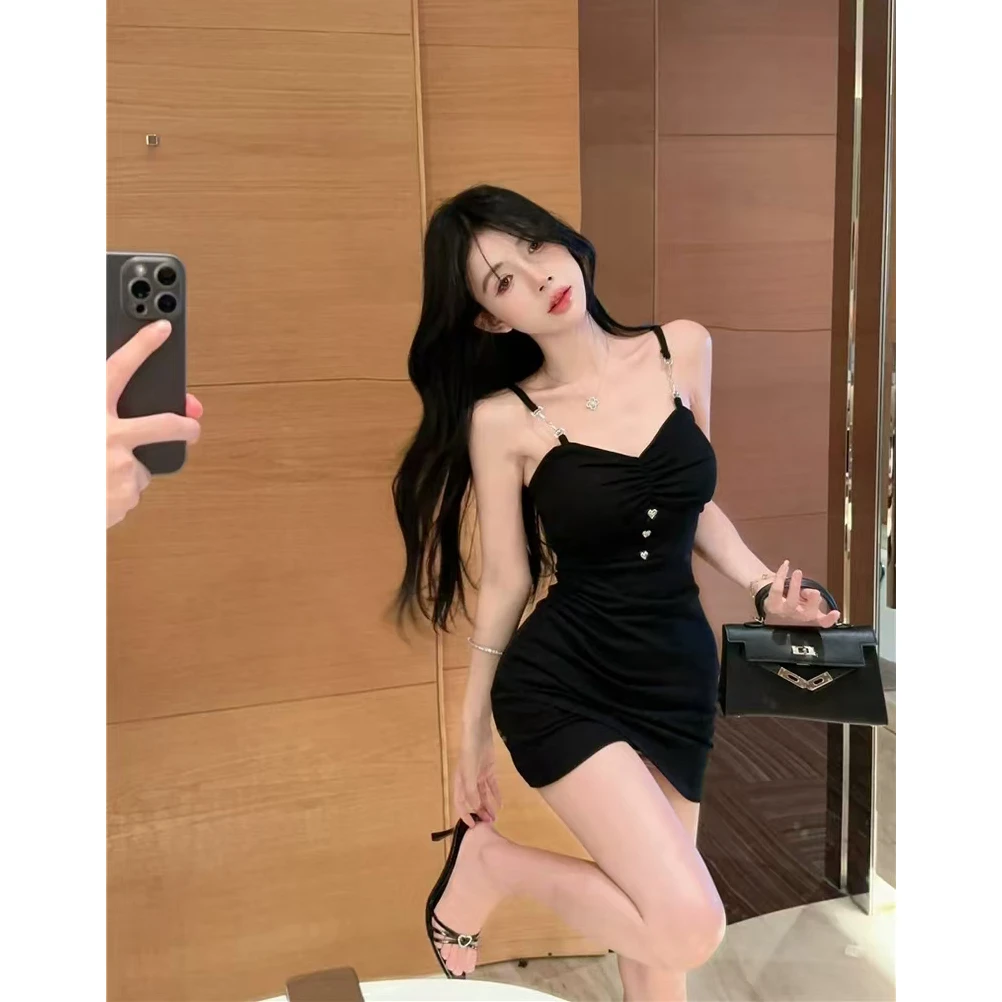 辣妹性感不规则吊带包臀连衣裙女夏季褶皱短裙收腰显瘦休闲小妈裙