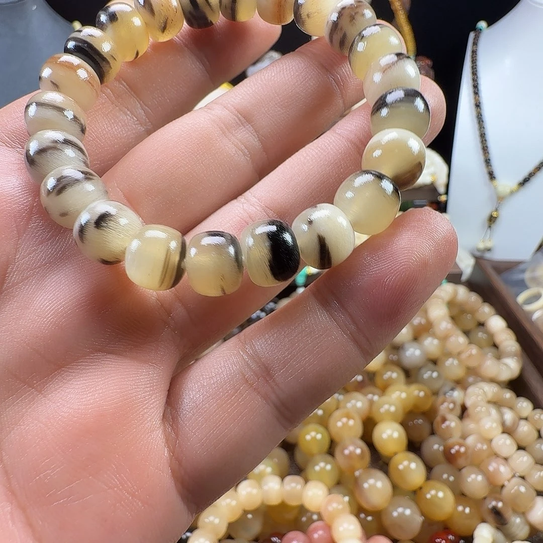 蕙***风皮质高级羊角手串