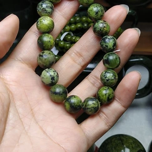 蛇纹石玉未镶嵌卡12手串