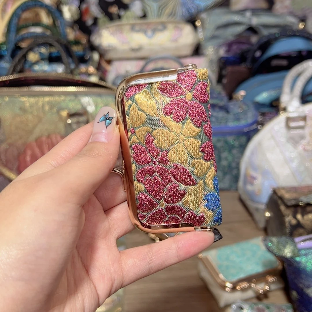 韶***雨织绣口金指甲刀包