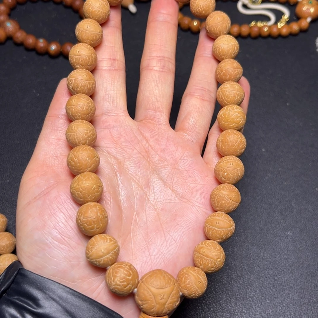 凤眼菩提吊坠13mm精品27颗手持