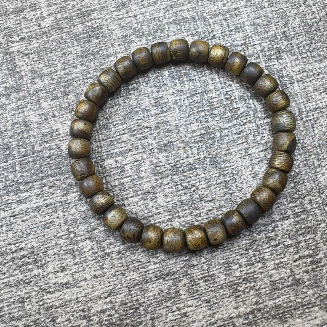 一***开沉香碎屑沉香绿棋鼓珠0.6