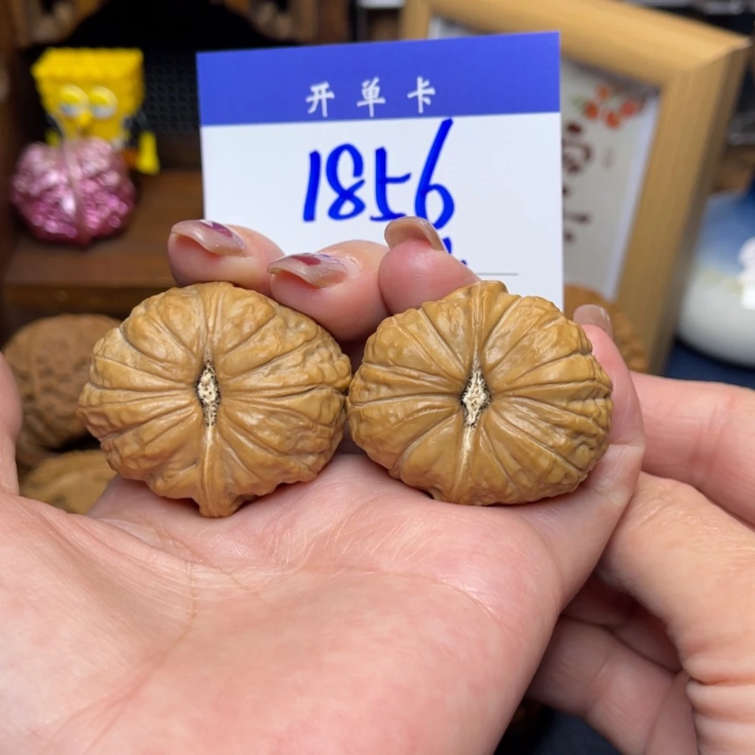 桃核把件我**武南瓜36李。