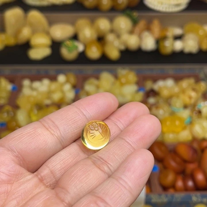 嘉***@蜜蜡未镶嵌珠宝奇石天然蜜蜡哆啦A梦