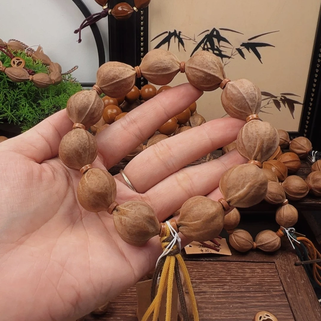 清***月手串橄榄核19.23梅林铁核