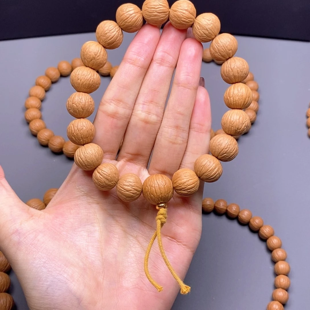 猴头核桃把件凤羽