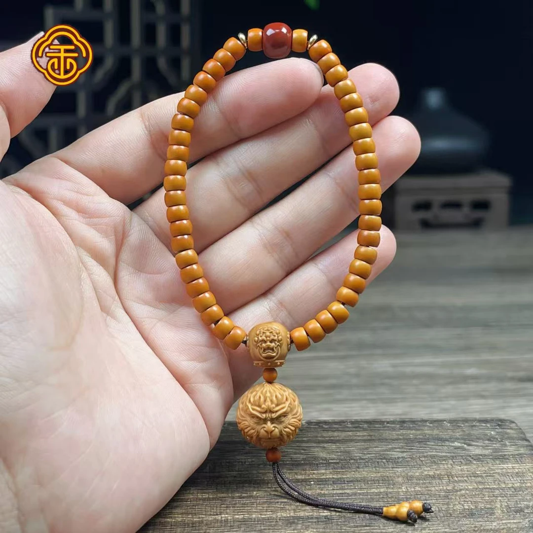 橄榄核尖 素串坠大圣 文玩手串