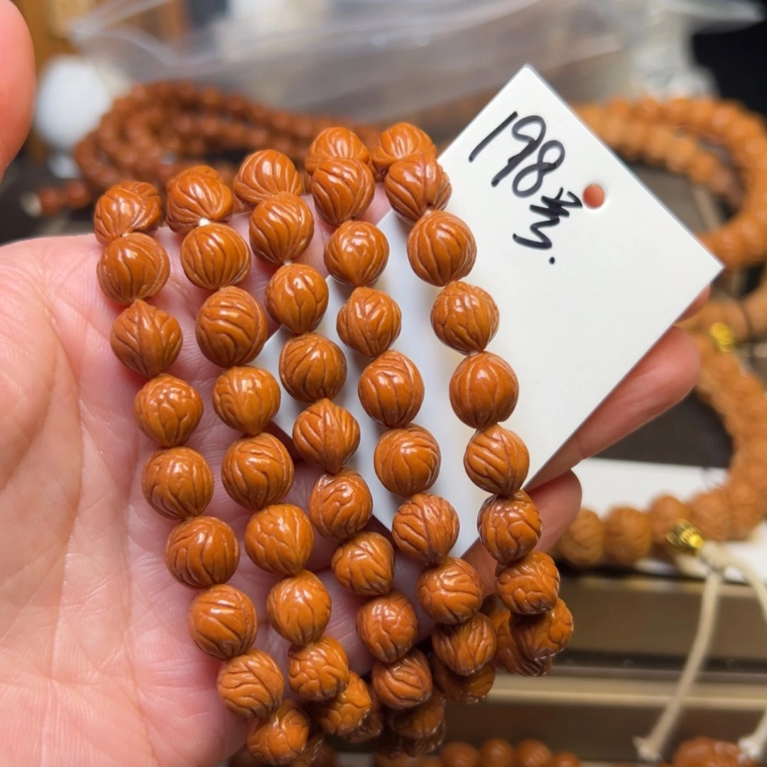 杜***荣桃核吊坠秦岭龙纹桃核9小奶豆脖挂