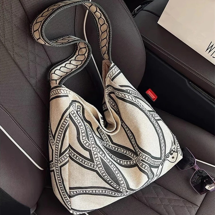 小众图腾印花帆布包包2025新款大容量托特包复古腋下包通勤单肩包