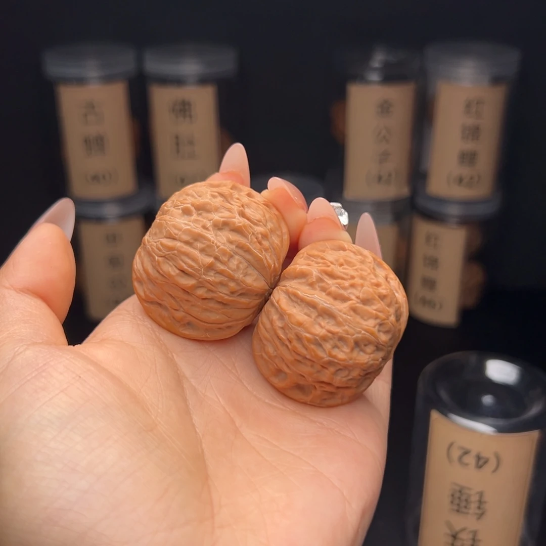 你***_文玩核桃吊坠铁锤