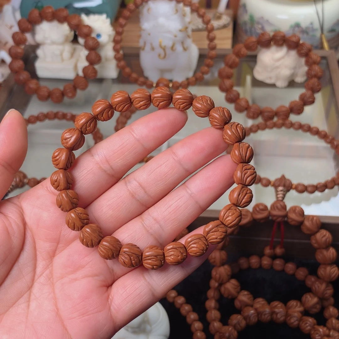 我***啊桃核吊坠双脊龙手串10