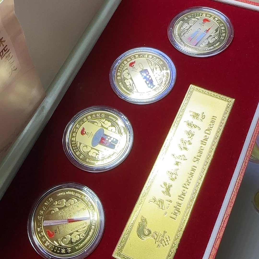 吉***店圣火纪念章福利出了