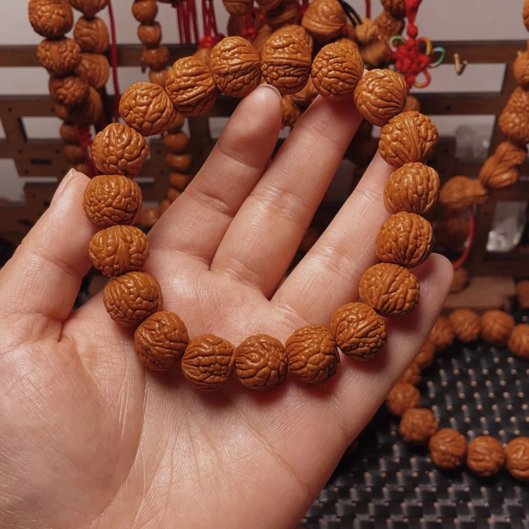 木质类龙纹桃枭手串