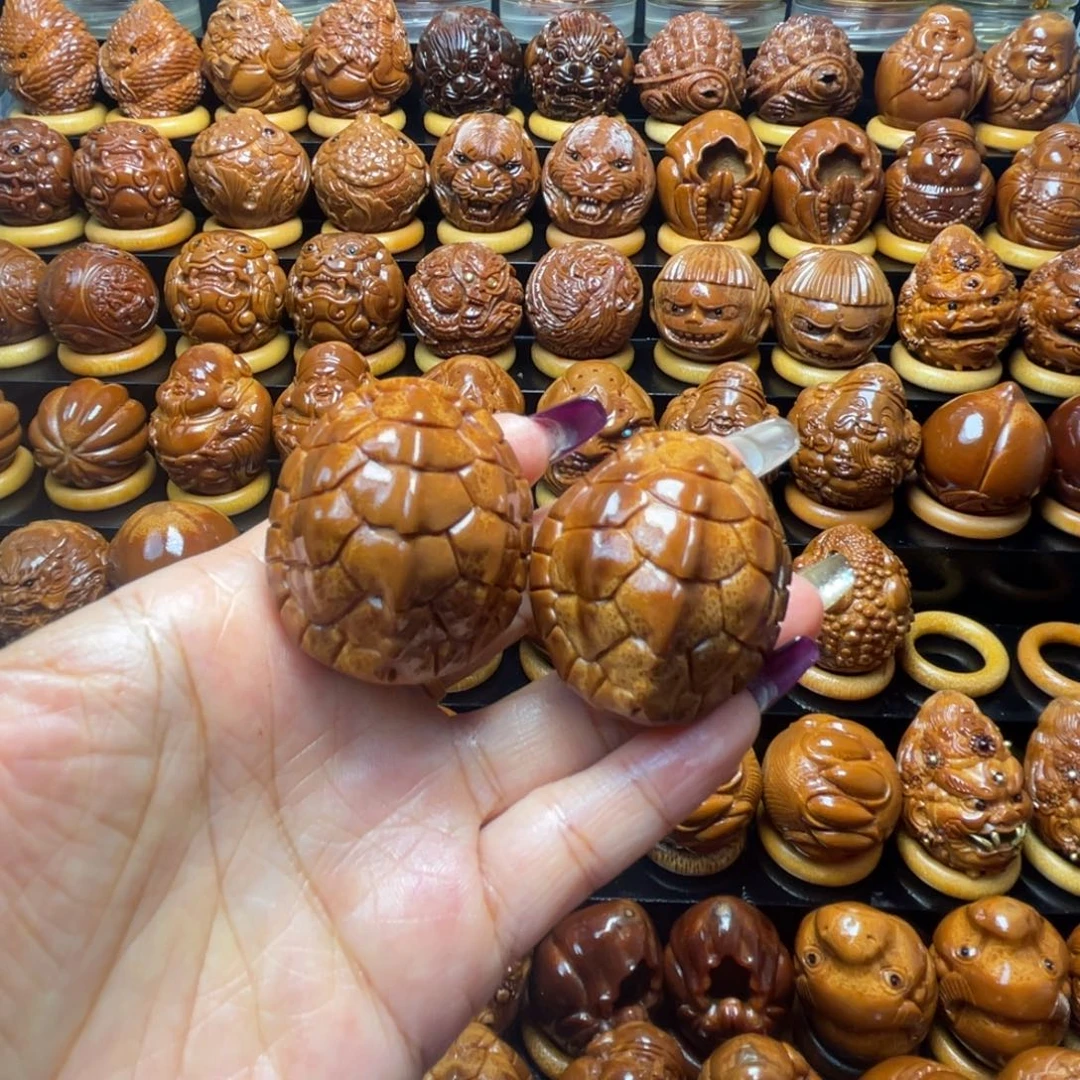 长***里橄榄核把件橄榄球