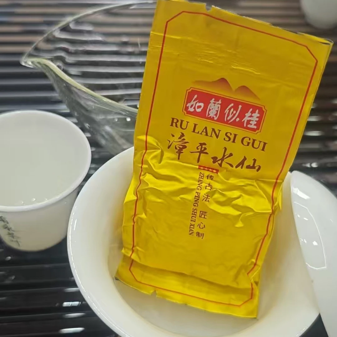 漳平水仙乌龙口粮级茶叶2025新春茶浓香清香型兰花桂花香南洋纸包