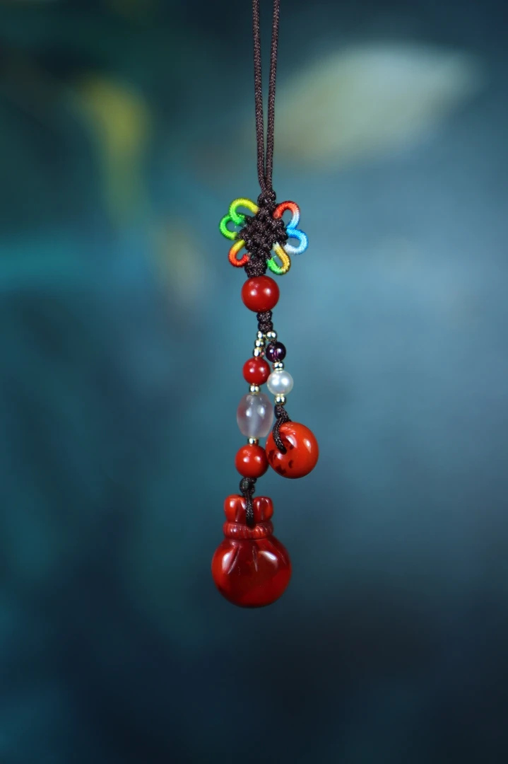 四川凉山南红玛瑙九口手工编制小精品侧挂手机挂