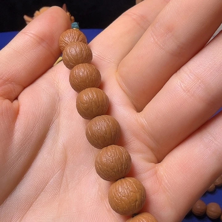 心***柠猴头核桃手串凤羽