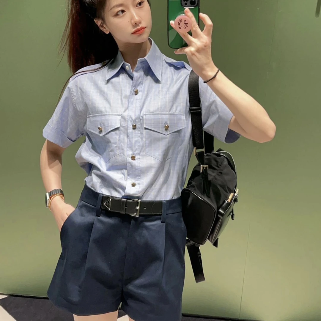 全新未使用 Prada/普拉达 藏蓝色三角标皮扣短裤 36码 02645