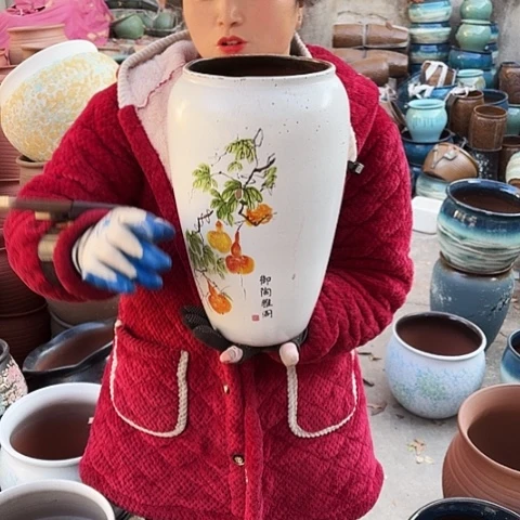 口17高33瑕疵盆子。