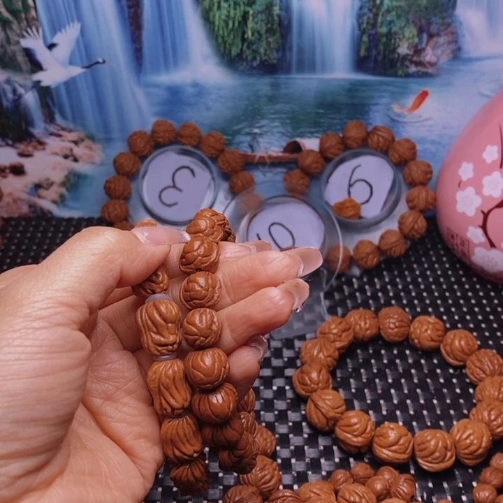 桃核吊坠推**盏龙纹桃核