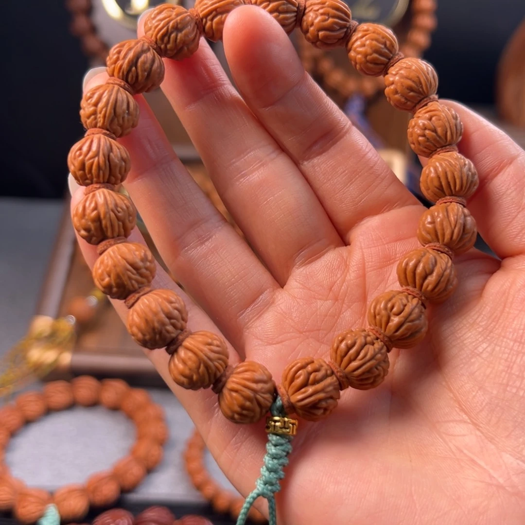 吊坠桃核14金豆野生