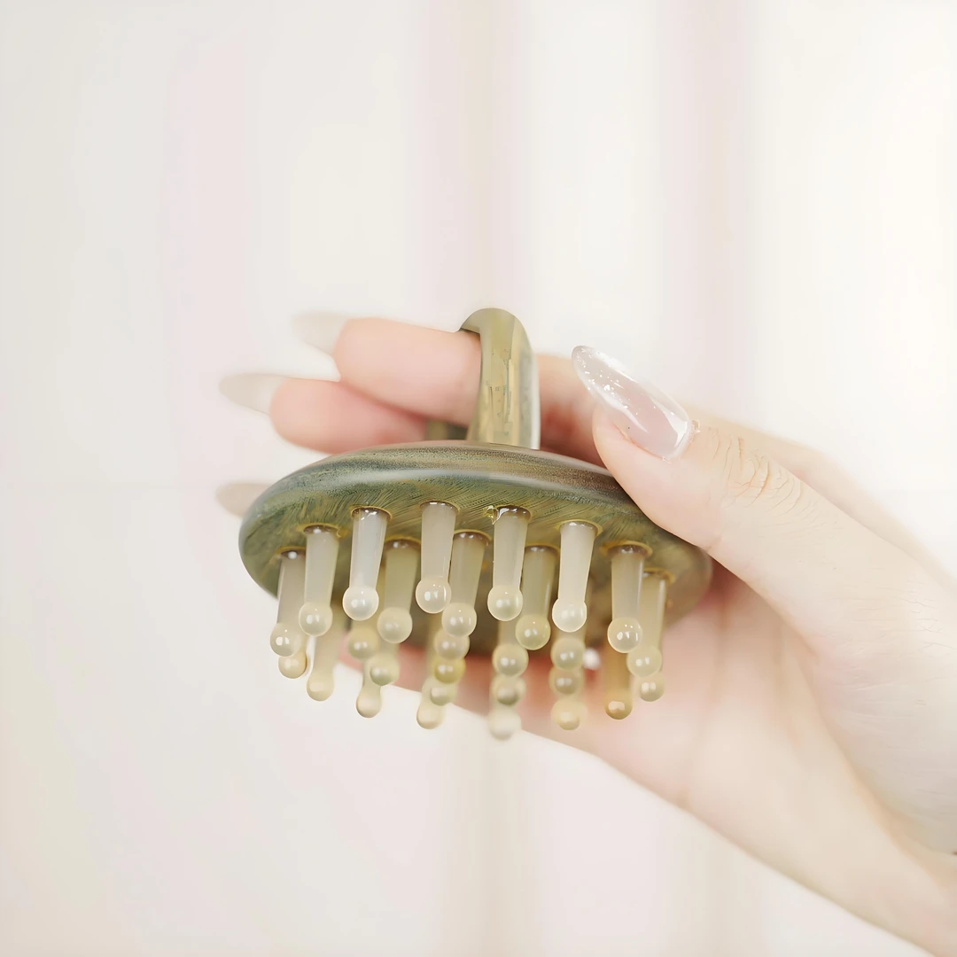 牛角按摩梳头皮经络梳指环洗发神器抓痒