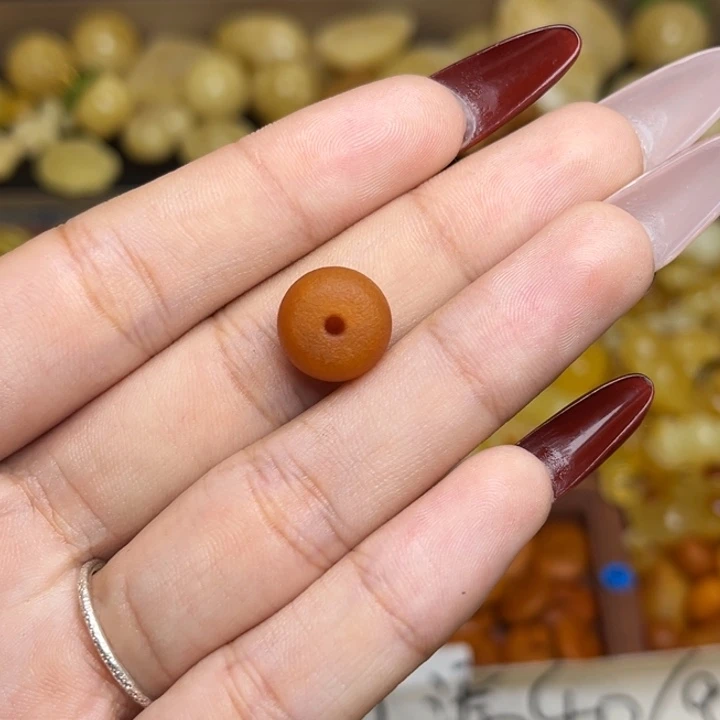 蜜蜡未镶嵌珠宝奇石鸡油红老蜡墩子一个