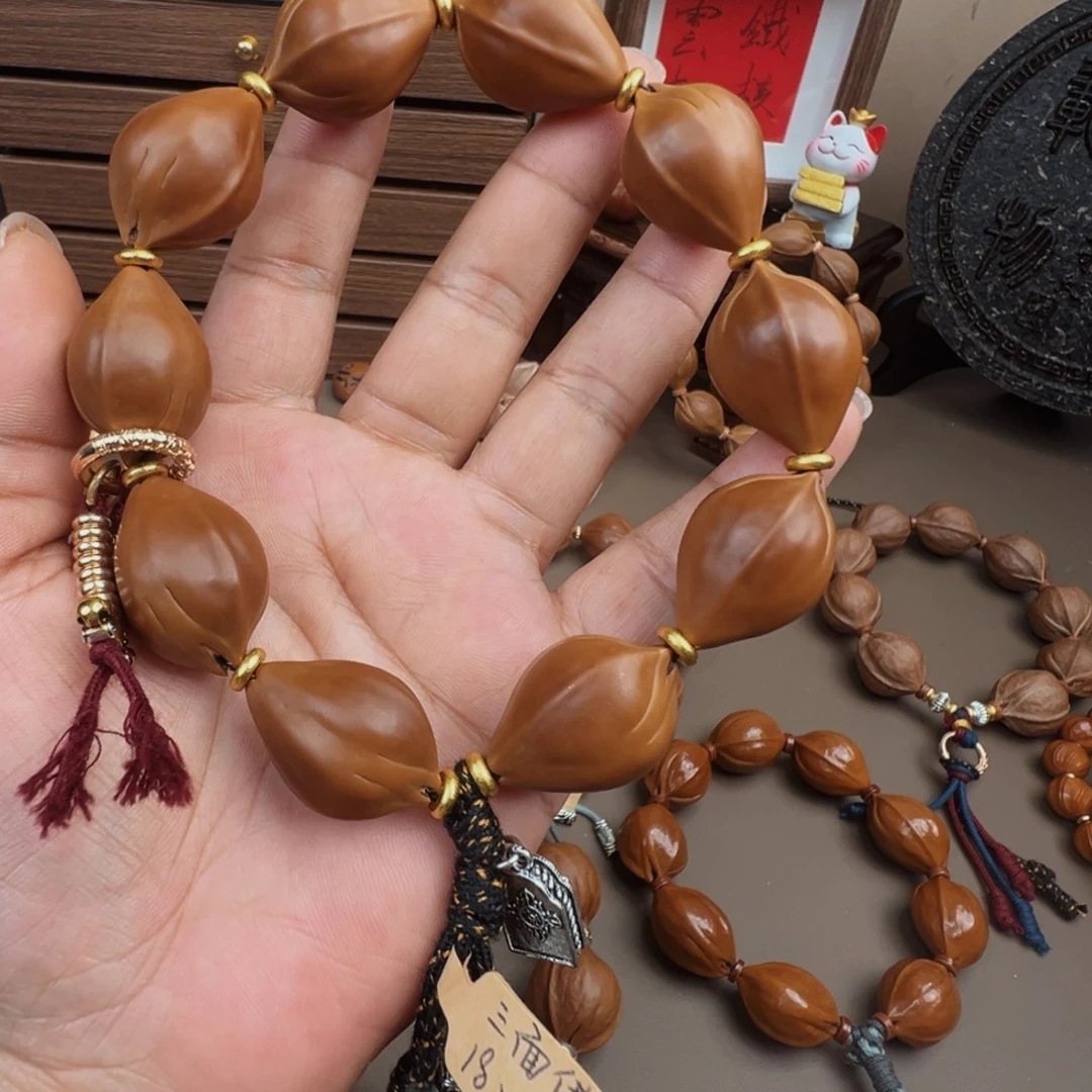 ～***~手串橄榄核梅林铁核三面佛 18×26 抛光