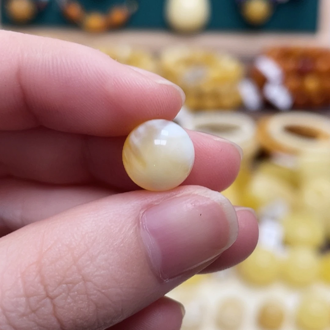 蜜蜡未镶嵌珠宝奇石10.5mm金瓷白妖花圆珠