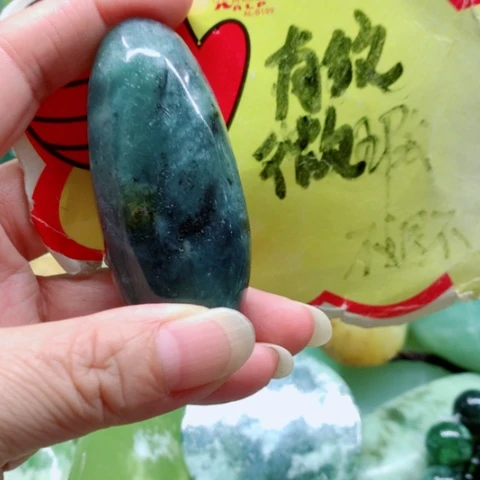 未镶嵌蛇纹石玉手把件