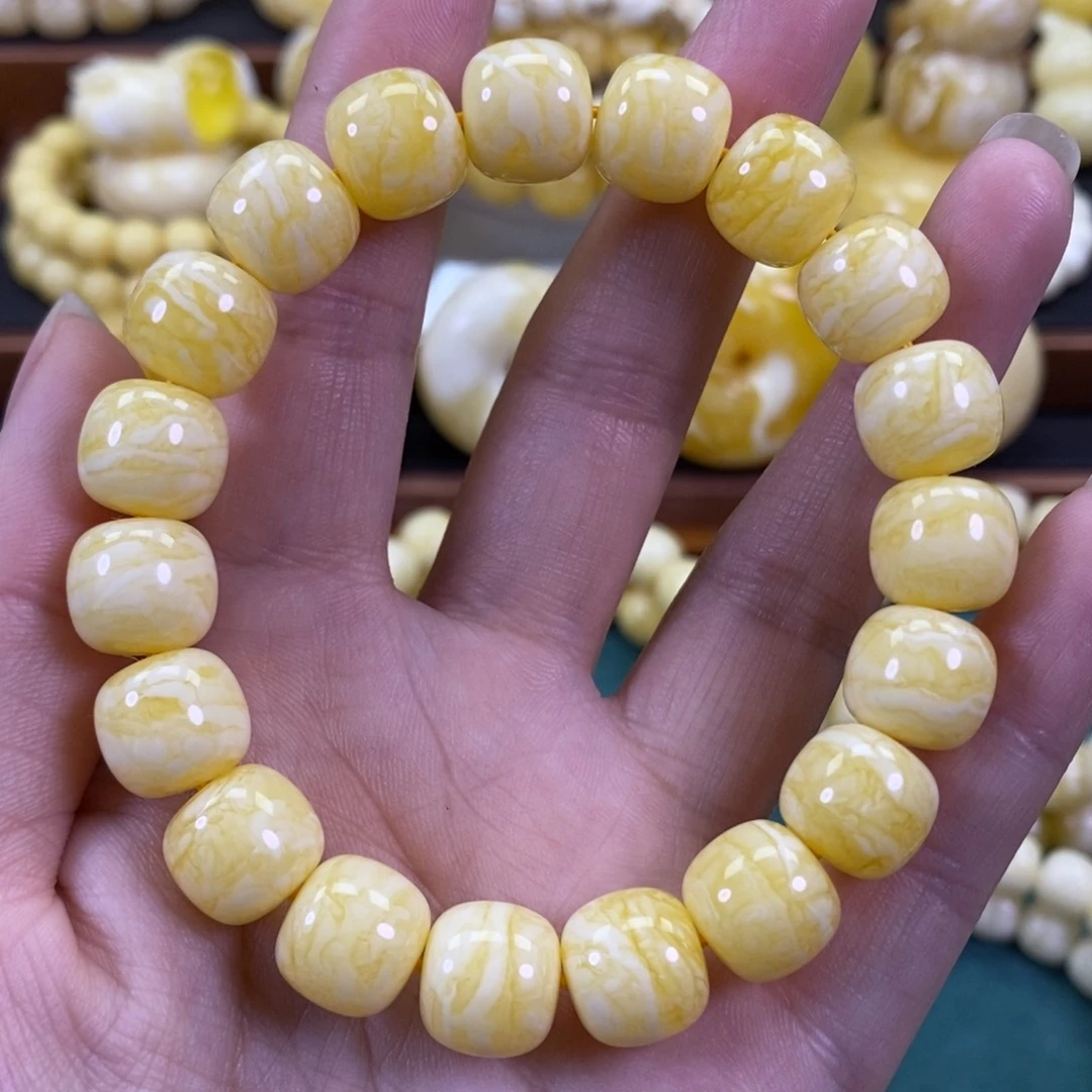 琥珀裸石未镶嵌同料橘白虎皮手串