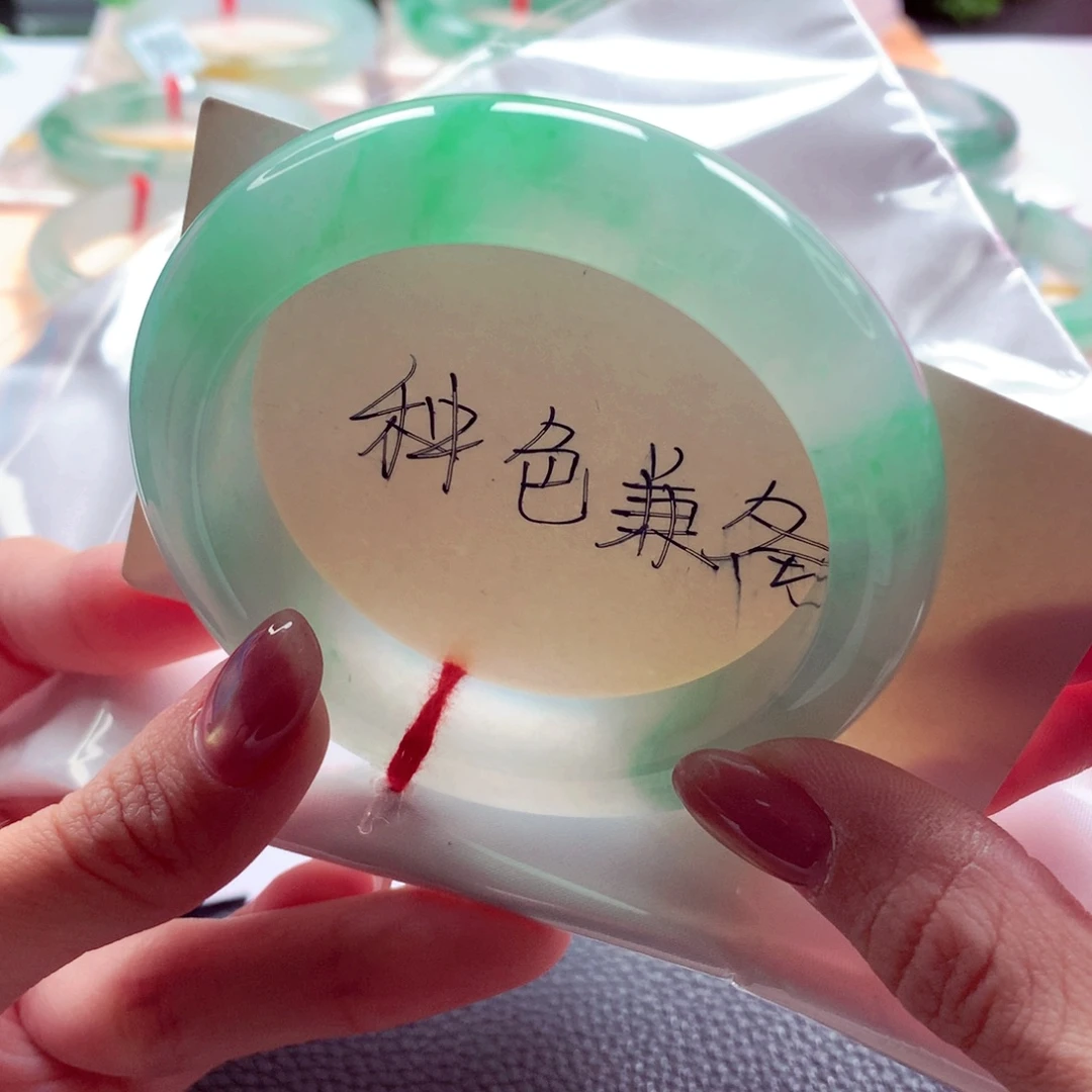 阳***橙翡翠未镶嵌手镯55 货头种色兼备中万超值价