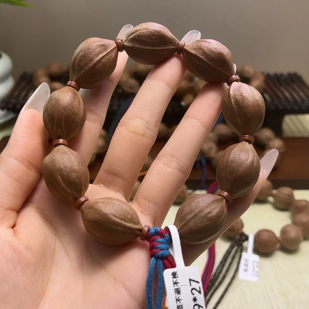 h****吊坠橄榄核梅林铁核文玩手串